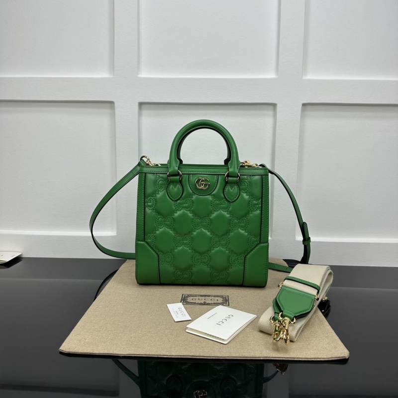 G*u*i top handle bags